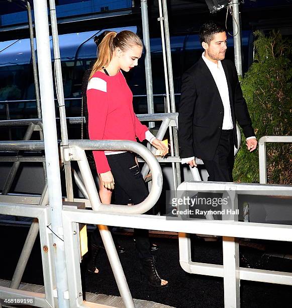 Model Cara Delevingne is seen at the Chanel Party on Yacht at Chelsea Pier on March 30, 2015 in New York City.