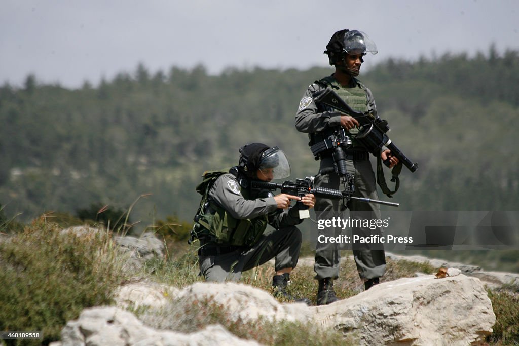 Soldiers in action during the Land Day as the Palestinian...