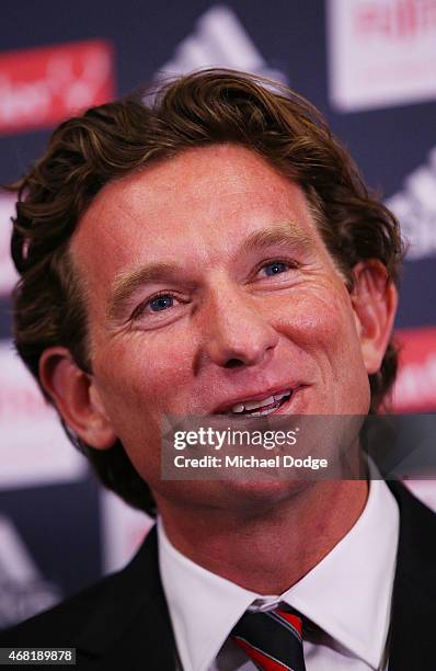 Bombers head coach James Hird reacts to media at Essendon Bombers headquarters after Essendon players were found not guilty from the AFL's...