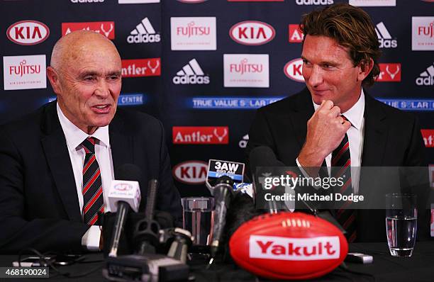 Bombers Chairman Paul Little and head coach James Hird react when speaking to media at Essendon Bombers headquarters after Essendon players were...