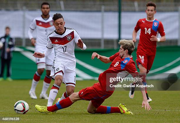 Devante Parker of Germany is challenged by Jiri Kulhanek of Czech Republic during the UEFA Under19 Elite Round match between Germany and Czech...