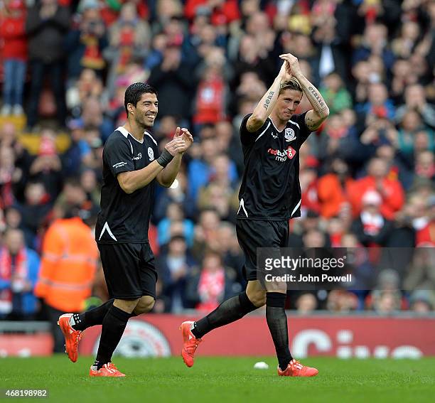 Luis Suarez and Fernando Torres of Liverpool during the Liverpool All Star Charity Match at Anfield on March 29, 2015 in Liverpool, England.