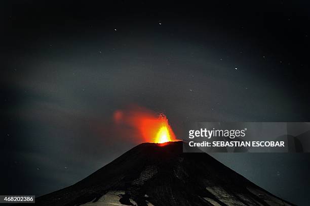 View of the Villarrica volcano, some 800 km south of Santiago, showing visible signs of activity on March 31, 2015. Earlier this month, in its first...