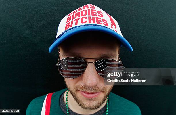 Fan poses near the par-three 16th hole during the third round of the Waste Management Phoenix Open at TPC Scottsdale on January 31, 2015 in...