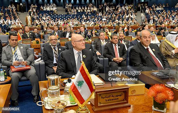 Lebanese prime minister Tammam Salam attends the 'Third International Pledging Humanitarian Conference for Syria' at the Bayan Palace in Kuwait City,...