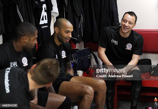John Terry, Thierry Henry and Glen Johnson in the dressing room before the Liverpool All Star Charity Match at Anfield on March 29, 2015 in...
