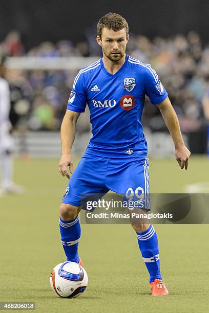 Jack McInerney of the Montreal Impact looks to play the ball during the MLS game against the Orlando City SC at the Olympic Stadium on March 28, 2015...