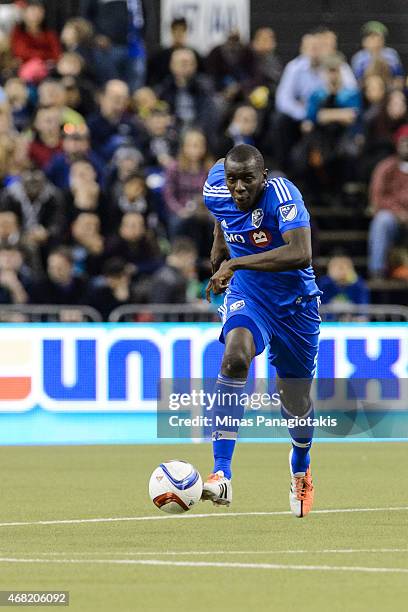 Bakary Soumare of the Montreal Impact moves the ball during the MLS game against the Orlando City SC at the Olympic Stadium on March 28, 2015 in...