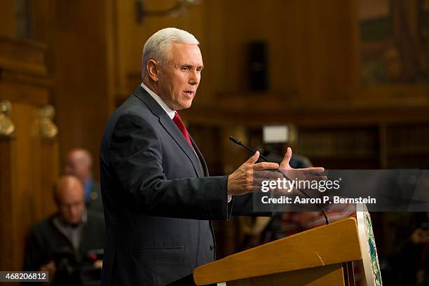 Governor Mike Pence of Indiana holds a press conference March 31, 2015 at the Indiana State Library in Indianapolis, Indiana. Pence spoke about the...