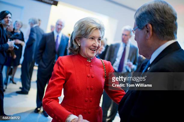 Former Sen. Kay Bailey Hutchison, R-Texas, greets former Sen. Trent Lott, R-Miss., during a gala that was part of the dedication ceremony for the...