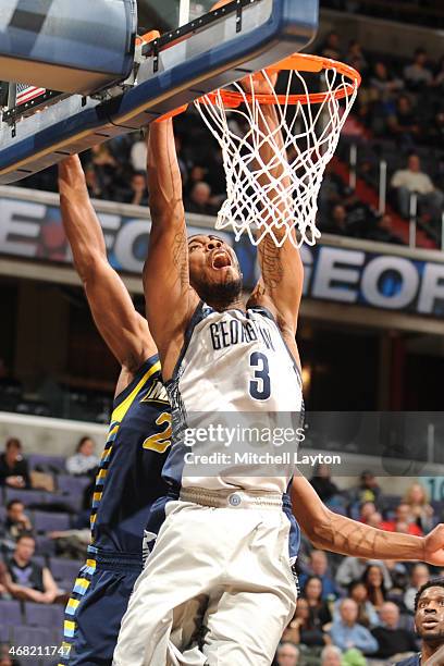 Mikael Hopkins of the Georgetown Hoyas drives to the basket during a college basketball game against the Marquette Golden Eagles on January 20, 2014...