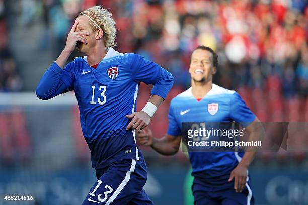 Brek Shea of the USA celebrates his scored goal with teammate Timmy Chandler during the international friendly match between Switzerland and the...