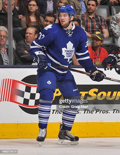Tim Erixon of the Toronto Maple Leafs skates during NHL game action against the Florida Panthers March 26, 2015 at the Air Canada Centre in Toronto,...