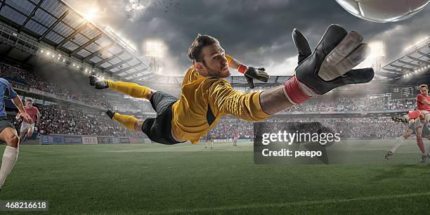 soccer goalkeeper extreme close up action - goalkeeper soccer stockfoto's en -beelden