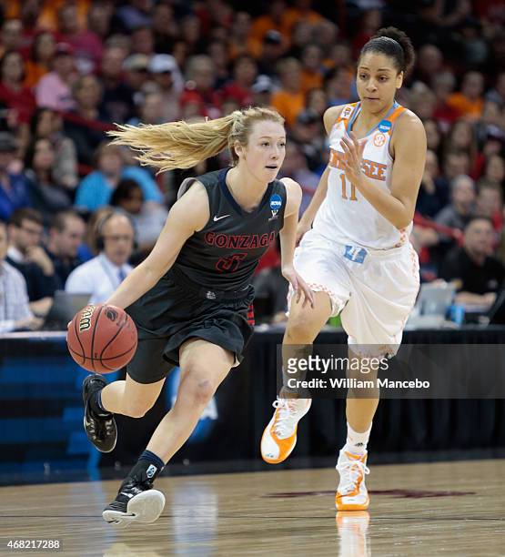 Georgia Stirton of the Gonzaga Bulldogs drives against Cierra Burdick of the Tennessee Lady Vols during the third round of the 2015 NCAA Division I...