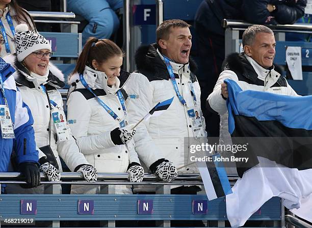 President of Estonia Andrus Ansip with his wife Anu Ansip and his daughter Liisa Ansip attend the Biathlon Women's 7.5 km Sprint during day two of...