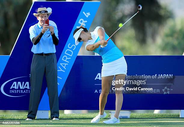 Michelle Wie of the USA under the close eye of her coach David Leadbetter during a practice round for the ANA Inspiration on the Dinah Shore...