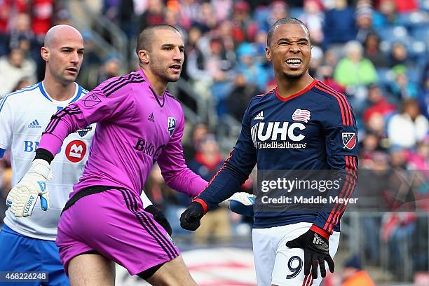 Charlie Davies of New England Revolution reacts after missing a shot on goal against the Montreal Impact during the second half at Gillette Stadium...