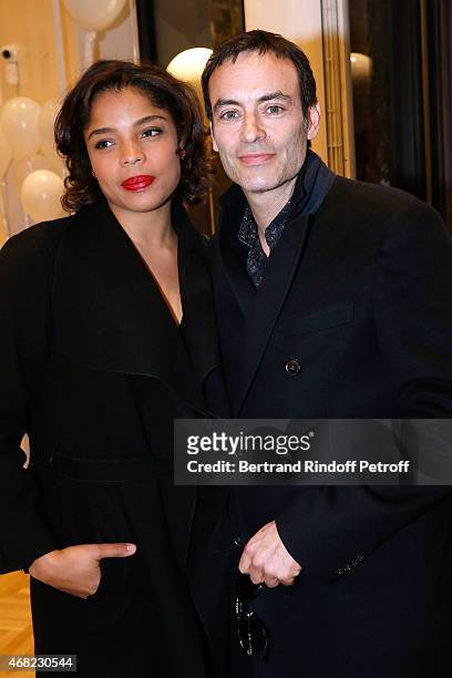 Anthony Delon and his companion Jina Djemba attend the Tommy Hilfiger Boutique Opening at Boulevard Capucines on March 31, 2015 in Paris, France.