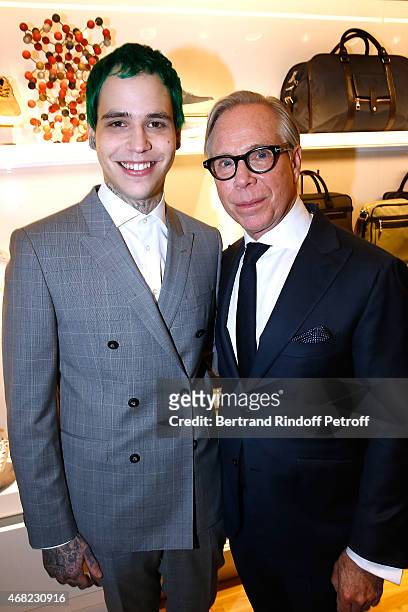 Tommy Hilfiger and his son Richard Hilfiger attend the Tommy Hilfiger Boutique Opening at Boulevard Capucines on March 31, 2015 in Paris, France.