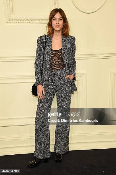 Alexa Chung attends the CHANEL Paris-Salzburg 2014/15 Metiers d'Art Collection at Park Avenue Armory on March 31, 2015 in New York City.