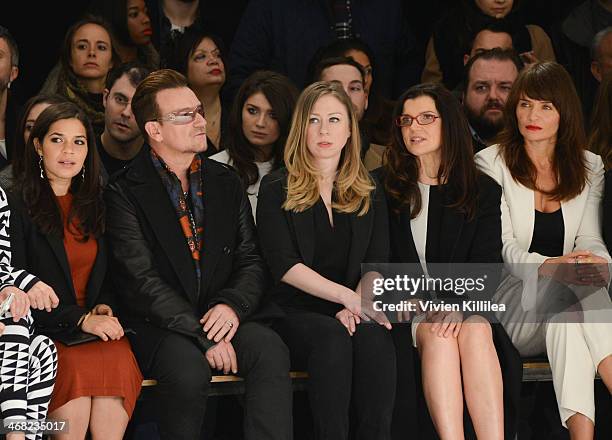 America Ferrera, Bono, Chelsea Clinton, a guest and Helena Christensen front row at Edun - Mercedes-Benz Fashion Week Fall 2014 at Skylight Modern on...