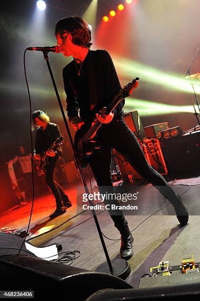 Johnny Bond and Van McCann of Catfish And The Bottlemen perform on stage at O2 Shepherd's Bush Empire on March 31, 2015 in London, United Kingdom.