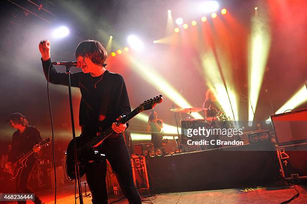 Johnny Bond, Van McCann and Bob Hall of Catfish And The Bottlemen perform on stage at O2 Shepherd's Bush Empire on March 31, 2015 in London, United...