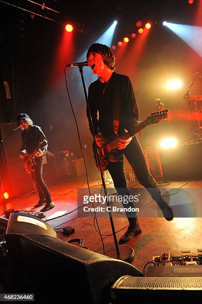 Johnny Bond and Van McCann of Catfish And The Bottlemen perform on stage at O2 Shepherd's Bush Empire on March 31, 2015 in London, United Kingdom.