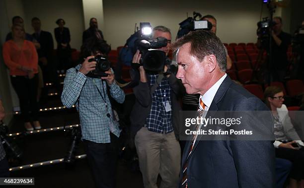 Ben McDevitt leaves a press conference following yesterday's verdict on the Essendon Bombers AFL anti-doping case at the Department of Health offices...