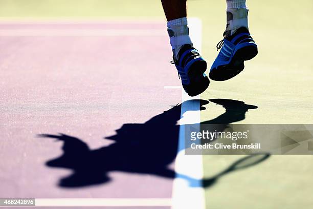 Andy Murray of Great Britain serves against Kevin Anderson of South Africa in their fourth round match during the Miami Open Presented by Itau at...