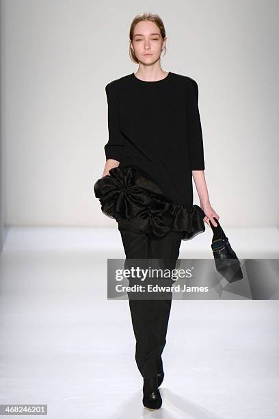 Model walks the runway at the Victoria Beckham show during Mercedes-Benz Fashion Week Fall 2014 at Cafe Rouge on February 9, 2014 in New York City.