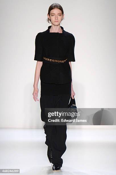 Model walks the runway at the Victoria Beckham show during Mercedes-Benz Fashion Week Fall 2014 at Cafe Rouge on February 9, 2014 in New York City.