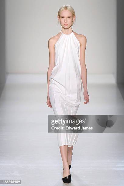 Model walks the runway at the Victoria Beckham show during Mercedes-Benz Fashion Week Fall 2014 at Cafe Rouge on February 9, 2014 in New York City.