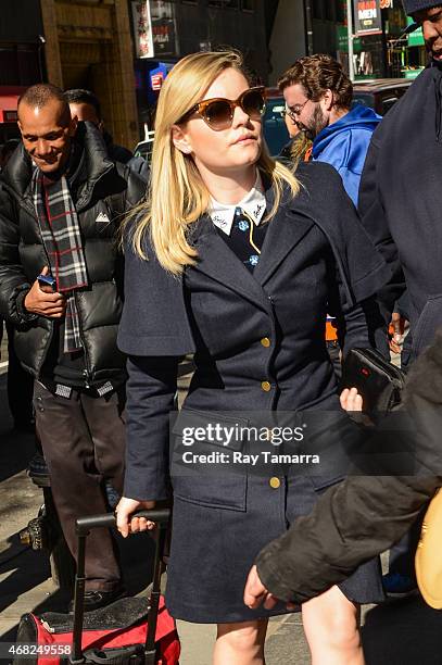 Actress Elisha Cuthbert enters the "Today Show" taping at the NBC Rockefeller Center Studios on March 31, 2015 in New York City.