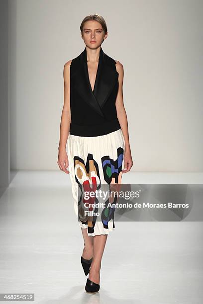 Model walks the runway at the Victoria Beckham presentation during Mercedes-Benz Fashion Week Fall 2014 at Cafe Rouge on February 9, 2014 in New York...