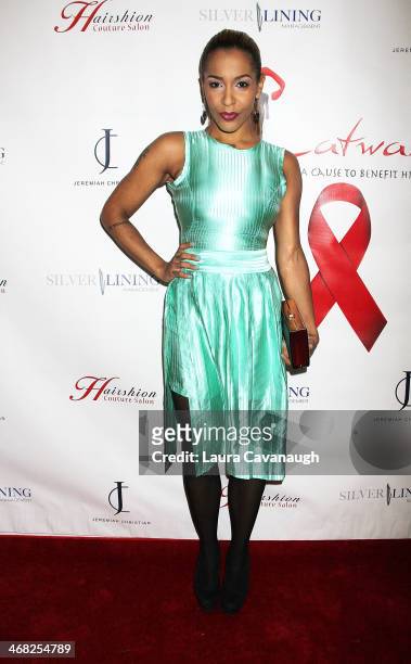 Amina attends the Hairshion fashion show during Mercedes-Benz Fashion Week Fall 2014 at Alvin Alley Studios on February 9, 2014 in New York City.