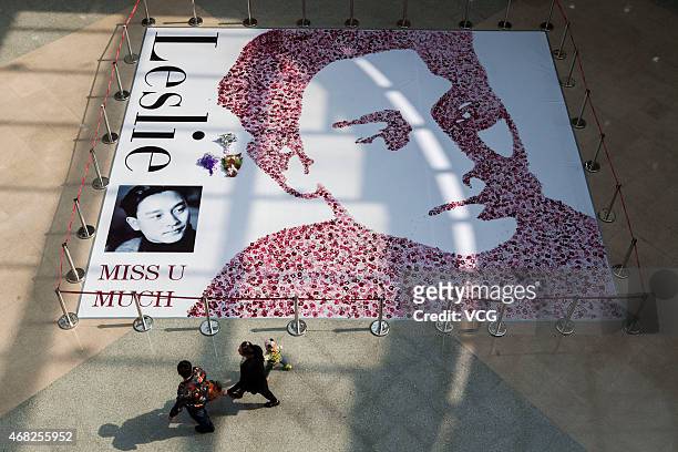 Leslie Cheung's portrait made of tens of thousands of fingerprints is seen on a canvas at Wanda Plaza on April 1, 2015 in Changchun, Jilin province...