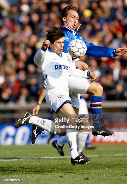 Gianfranco Zola of Parma FC is challenged by David Platt of Sampdoria during a Serie A match on March 12, 1995 in Parma, Italy.