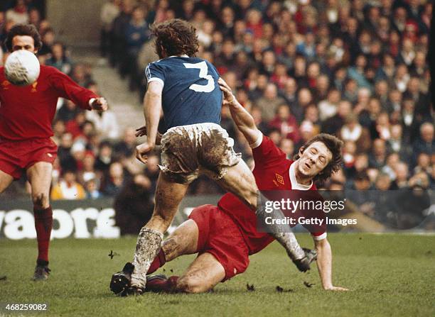 Liverpool player Jimmy Case puts in a hard tackle on Everton full back Mike Pejic during an FA Cup semi final match played at Maine Road on April 23,...