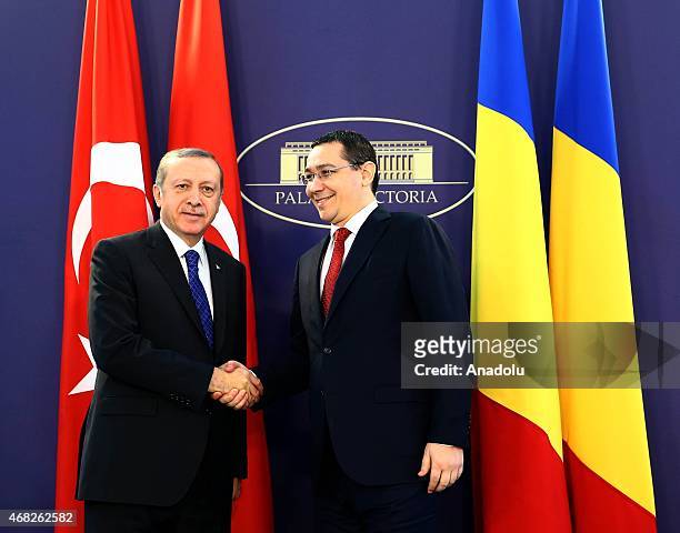 Turkish President Recep Tayyip Erdogan is welcomed by Romanian Prime Minister Victor Ponta prior to a meeting in Bucharest, Romania on April 01, 2015.