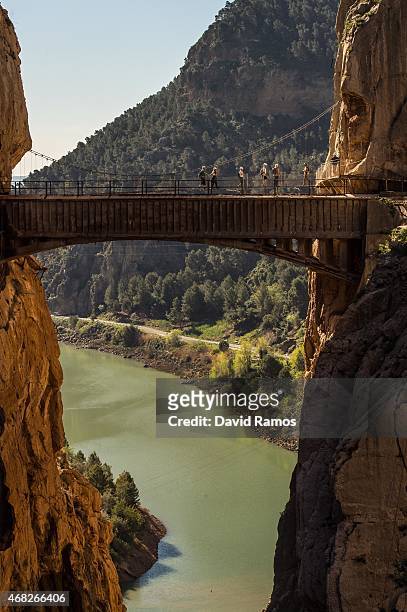 Tourists walk along the 'El Caminito del Rey' footpath on April 1, 2015 in Malaga, Spain. 'El Caminito del Rey', which was built in 1905 and winds...