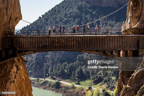 Tourists walk along the 'El Caminito del Rey' footpath on April 1, 2015 in Malaga, Spain. 'El Caminito del Rey', which was built in 1905 and winds...