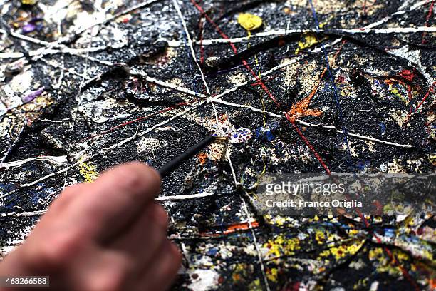 Alchemy' by Jackson Pollock is restored at the Opificio delle Pietre Dure on January 26, 2015 in Florence, Italy. The restored painting, regarded as...