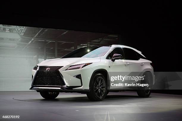 The new 2016 Lexus RX car is displayed during press previews at the New York International Auto Show at the Javits Center on April 1, 2015 in New...