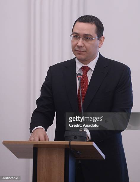 Romanian Prime Minister Victor Ponta delivers a speech during Turkey-Romania business forum at Romania chamber of industry and trade in Bucharest on...