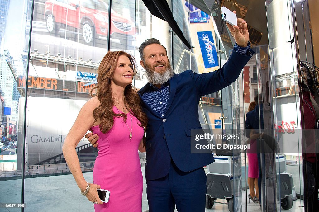 Mark Burnett And Roma Downey Visit "Extra"