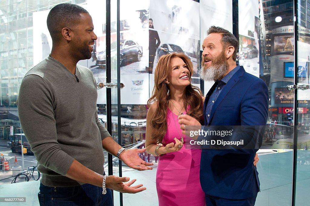 Mark Burnett And Roma Downey Visit "Extra"