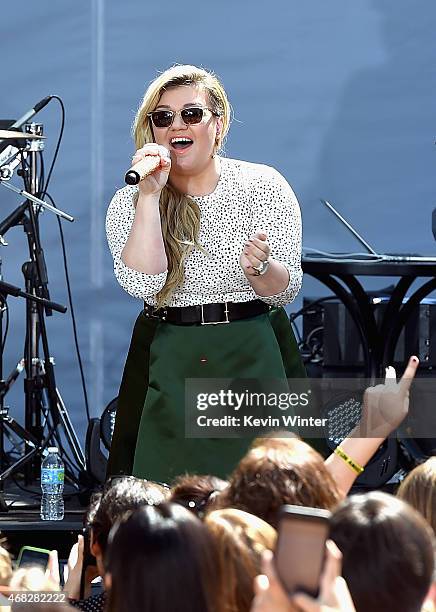 Singer Kelly Clarkson performs onstage for Chevrolet's Best Day Ever with iHeartRadio at The Grove on April 1, 2015 in Los Angeles, California.