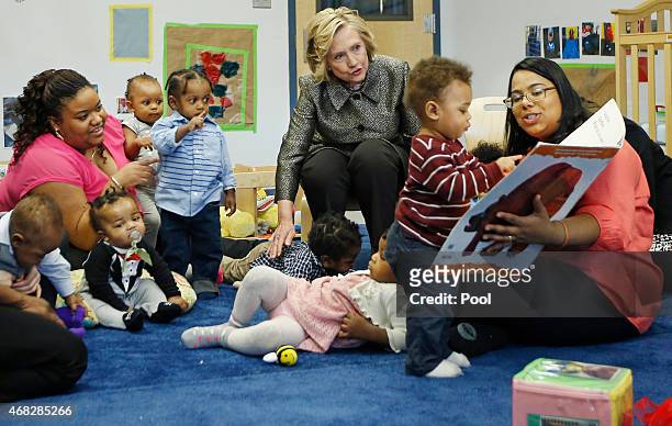 Hillary Rodham Clinton, center rear, visits children in a classroom at FirstStepNYC, an early childhood development center on April 1, 2015 in the...